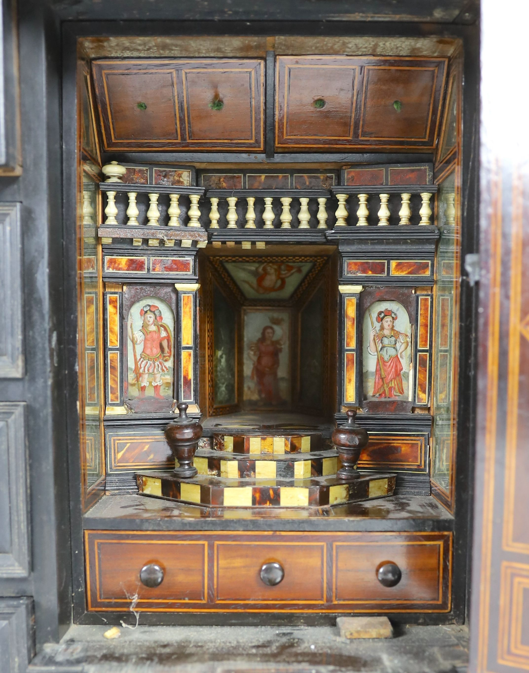 An early 18th century Portuguese ebonised table cabinet, width 87cm, depth 38cm, height 57cm